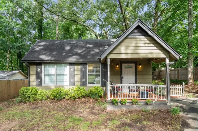 front view of a house with a yard