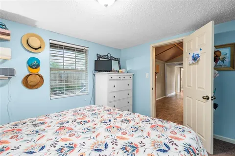 a bathroom with a toilet and a sink