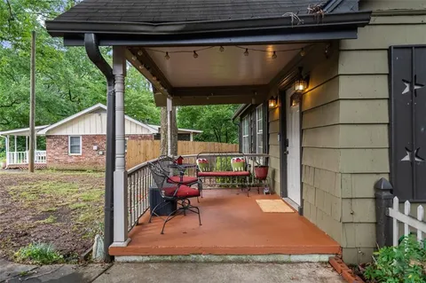 a backyard of a house with seating space