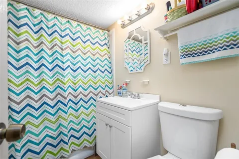 a bathroom with a sink and a toilet