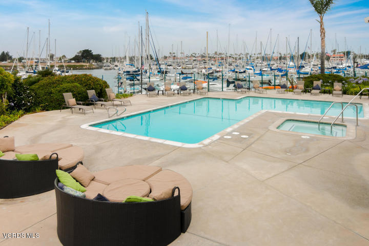 2901 Peninsula Road, Unit 237 Oxnard, CA 93035 - Photo 32 of 35 a view of a swimming pool with outdoor seating