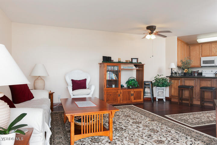 2901 Peninsula Road, Unit 237 Oxnard, CA 93035 - Photo 9 of 35 a living room with furniture and a rug