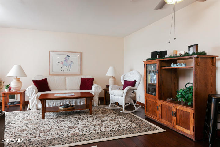 2901 Peninsula Road, Unit 237 Oxnard, CA 93035 - Photo 10 of 35 a living room with furniture and a rug