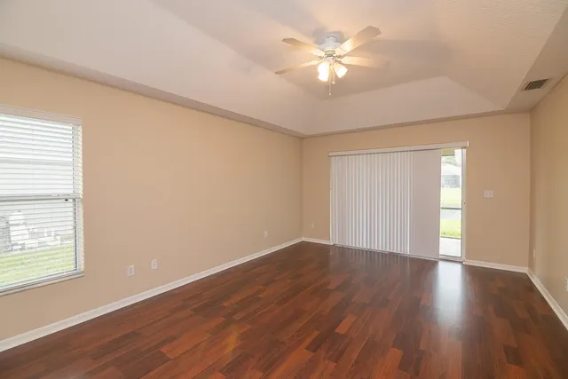 a kitchen with stainless steel appliances granite countertop a sink refrigerator and microwave