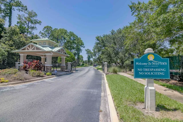 a view of a street with sitting area