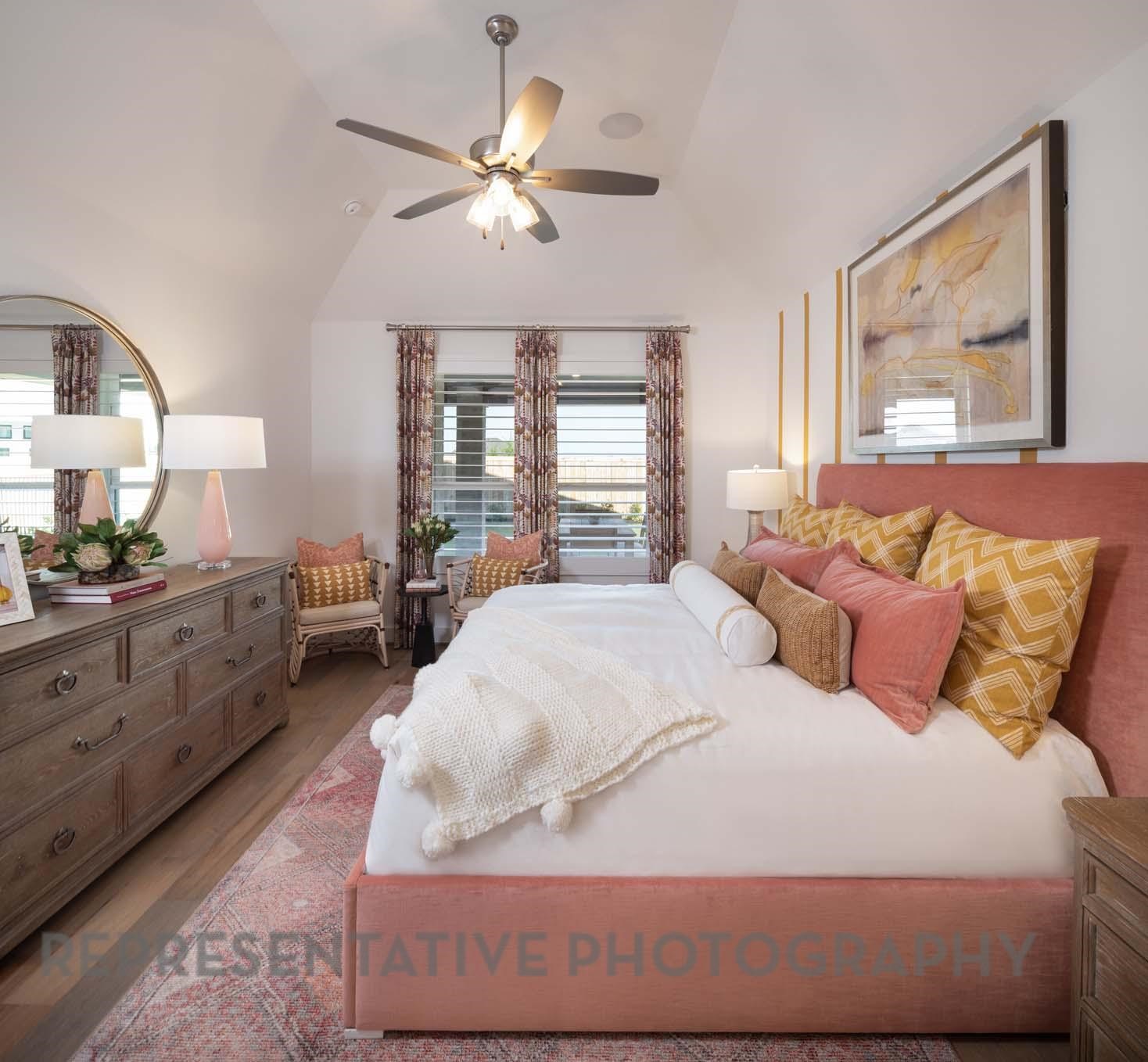 5310 Getty Lane Manvel, TX 77578 - Photo 15 of 37 a bedroom with a large bed and a window