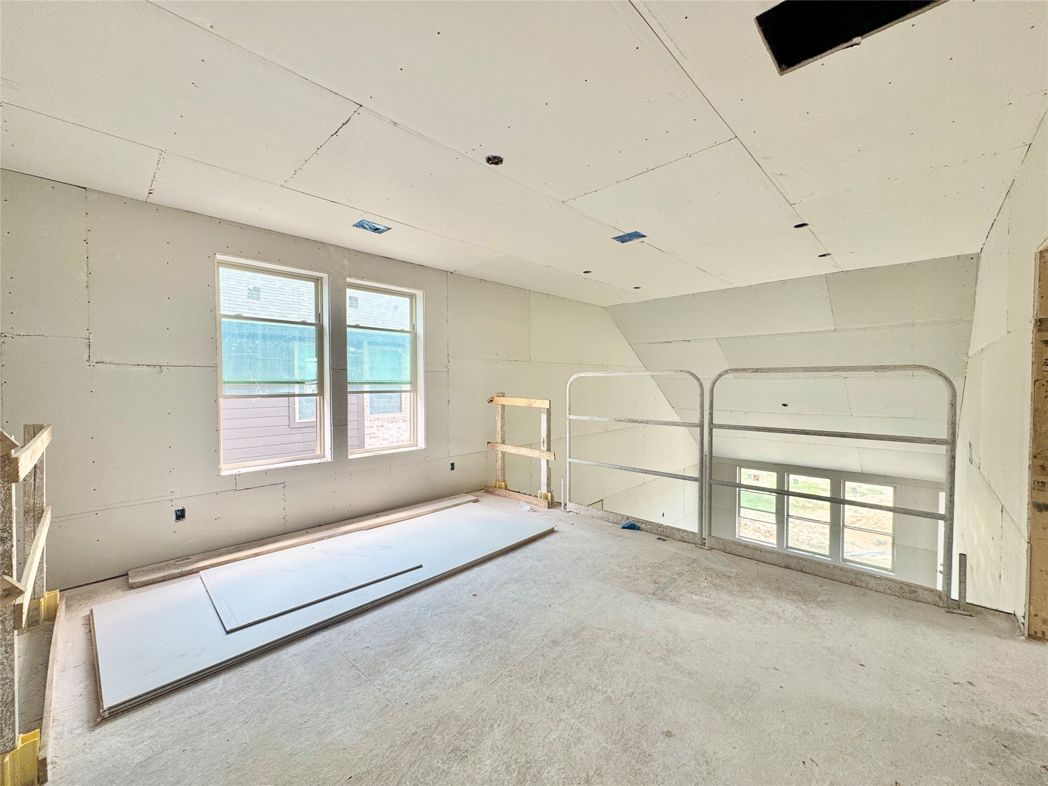 5310 Getty Lane Manvel, TX 77578 - Photo 21 of 37 a spacious bedroom with a bed and a window