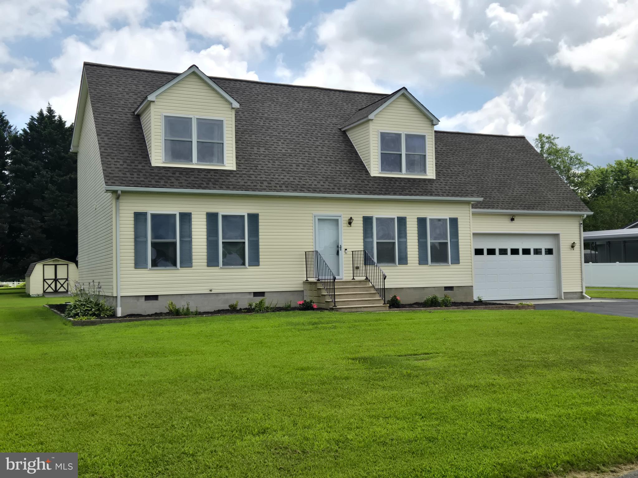 18453 Joseph Road Milton, DE 19968 - Photo 1 of 49 a big house with a big yard and more windows