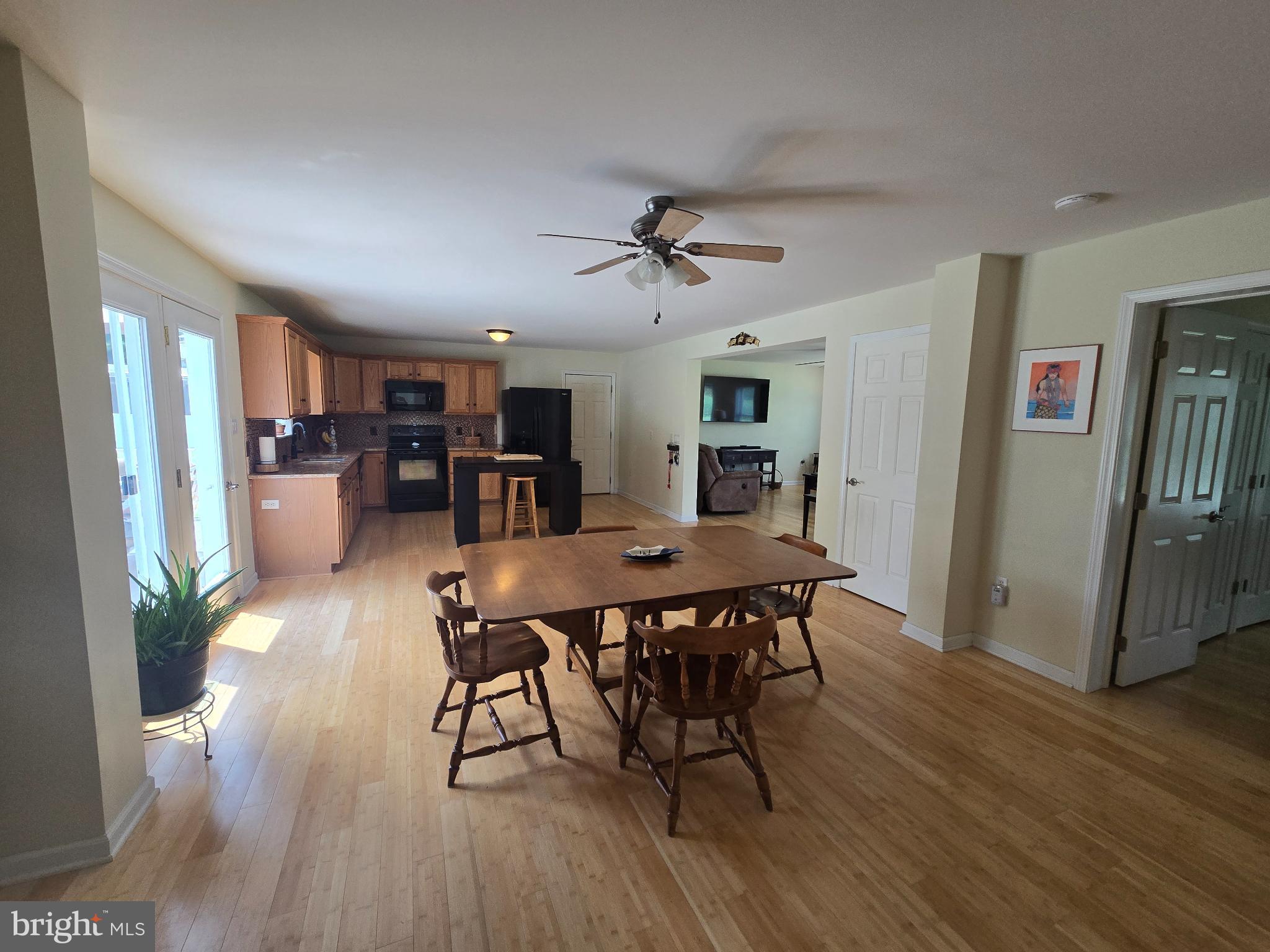 18453 Joseph Road Milton, DE 19968 - Photo 11 of 49 a view of a dining room with furniture and wooden floor