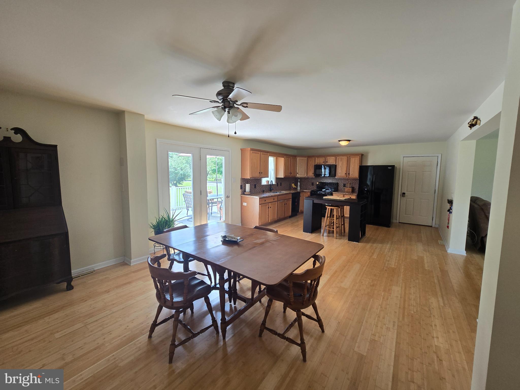 18453 Joseph Road Milton, DE 19968 - Photo 12 of 49 a view of a dining room with furniture and window