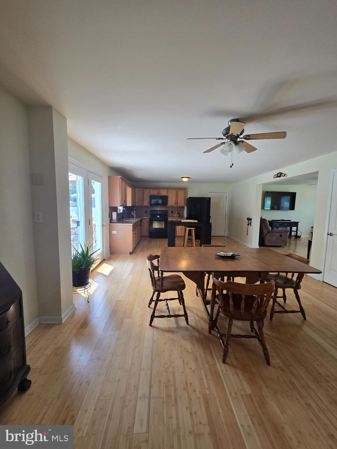 18453 Joseph Road Milton, DE 19968 - Photo 13 of 49 a view of a dining room with furniture and wooden floor