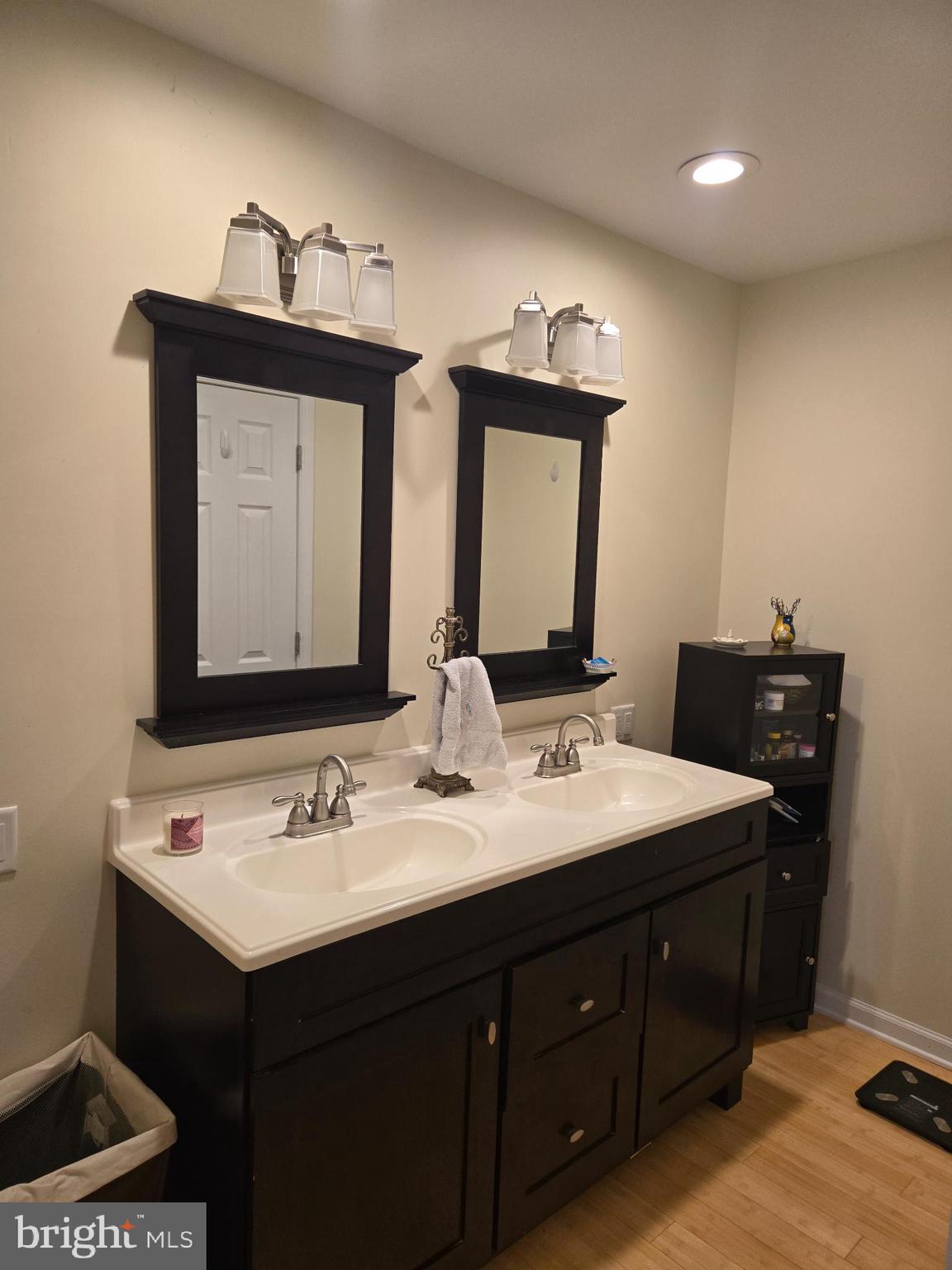 18453 Joseph Road Milton, DE 19968 - Photo 19 of 49 a bathroom with a sink vanity and mirror