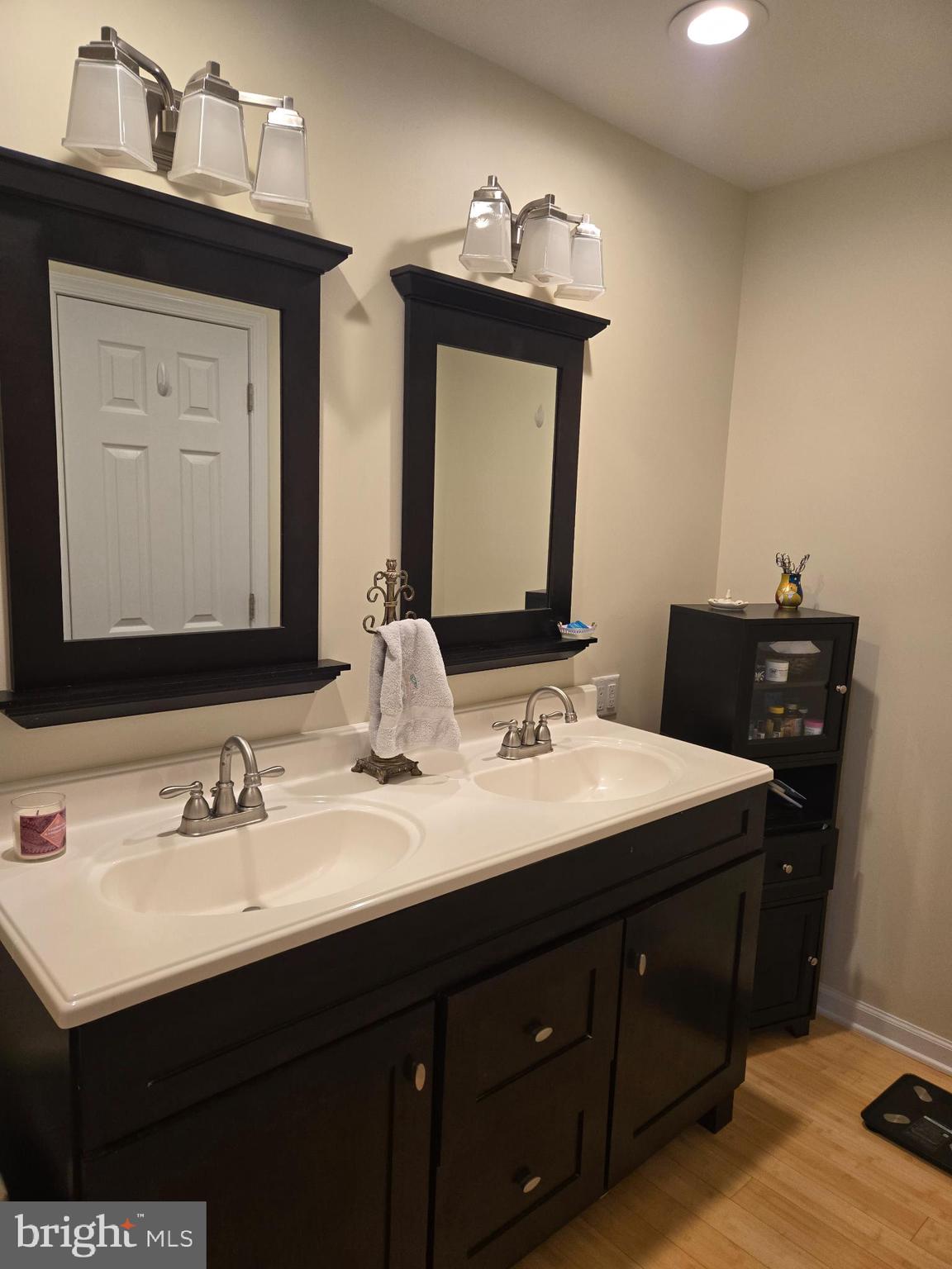 18453 Joseph Road Milton, DE 19968 - Photo 20 of 49 a bathroom with double sink and two mirror