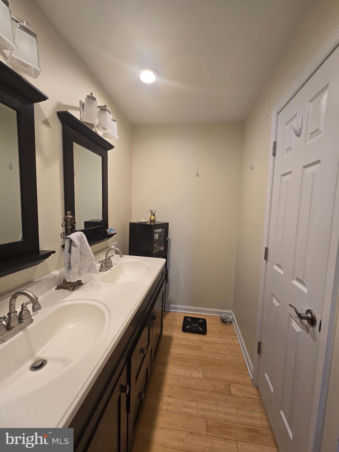 18453 Joseph Road Milton, DE 19968 - Photo 22 of 49 a bathroom with a sink and a mirror