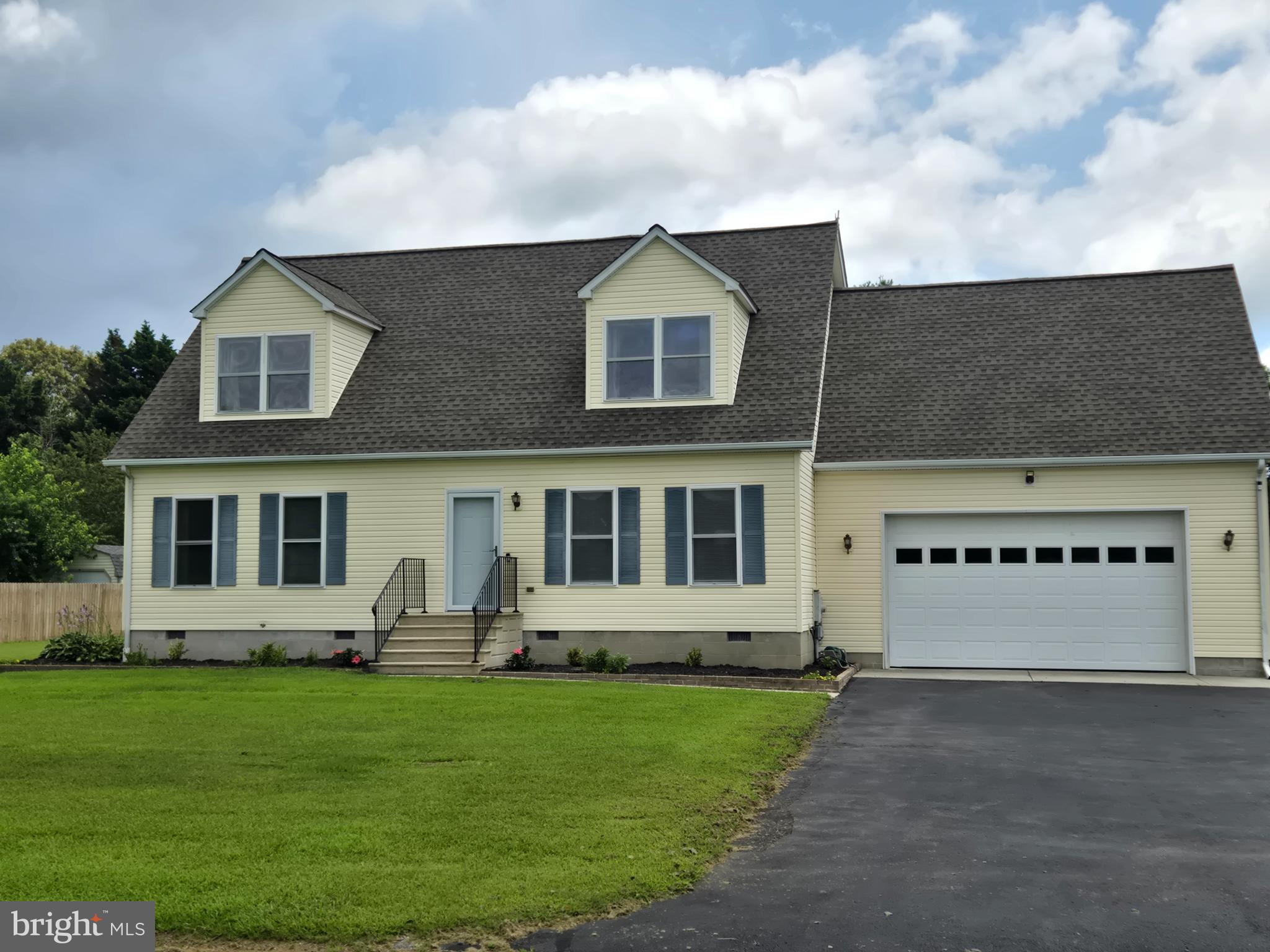 18453 Joseph Road Milton, DE 19968 - Photo 3 of 49 a house view with a garden space