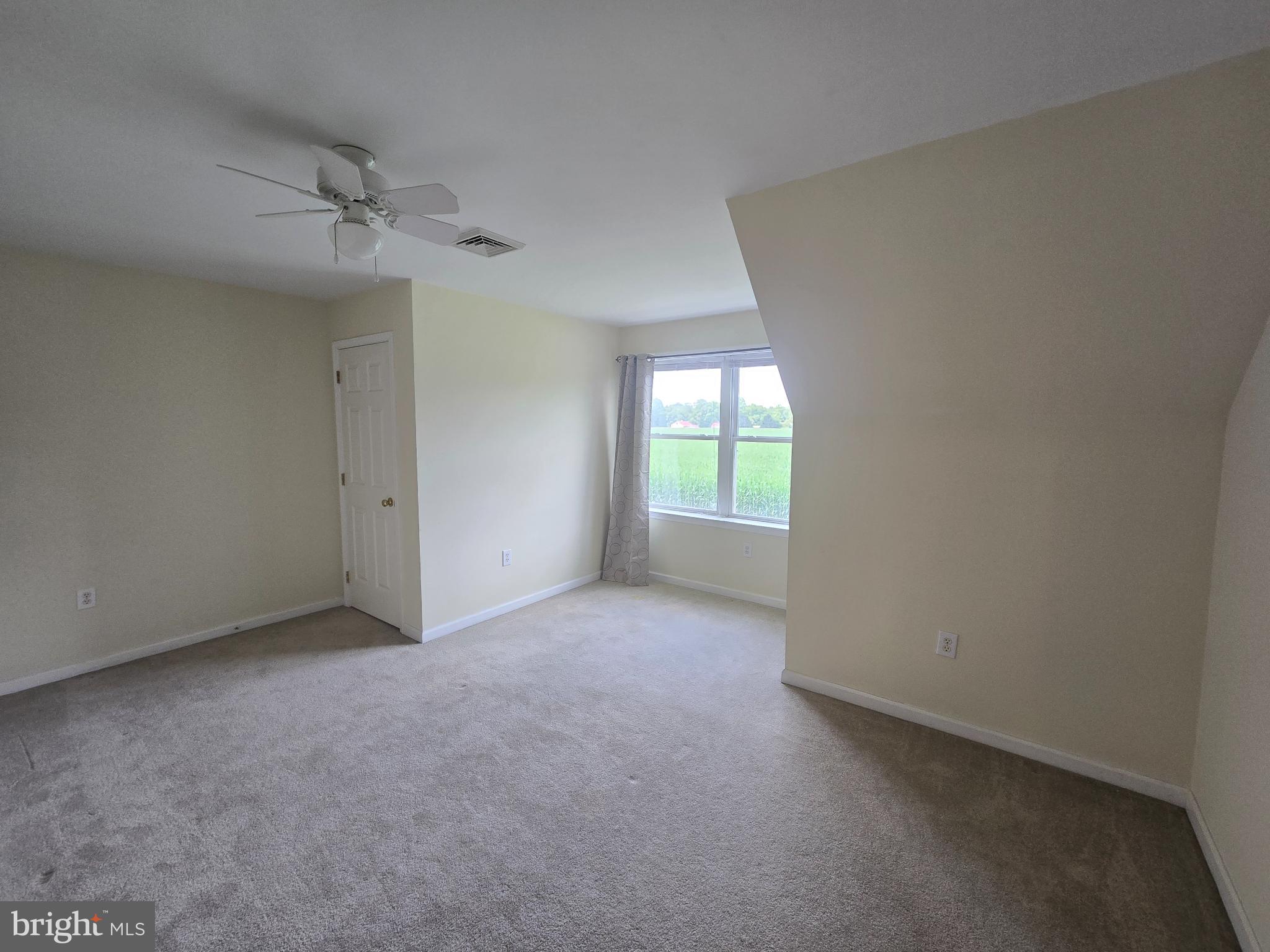 18453 Joseph Road Milton, DE 19968 - Photo 31 of 49 an empty room with a window