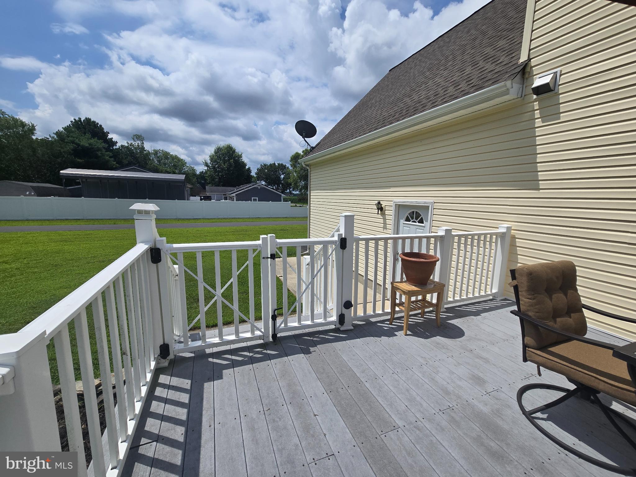 18453 Joseph Road Milton, DE 19968 - Photo 39 of 49 a view of a chair and tables in the balcony