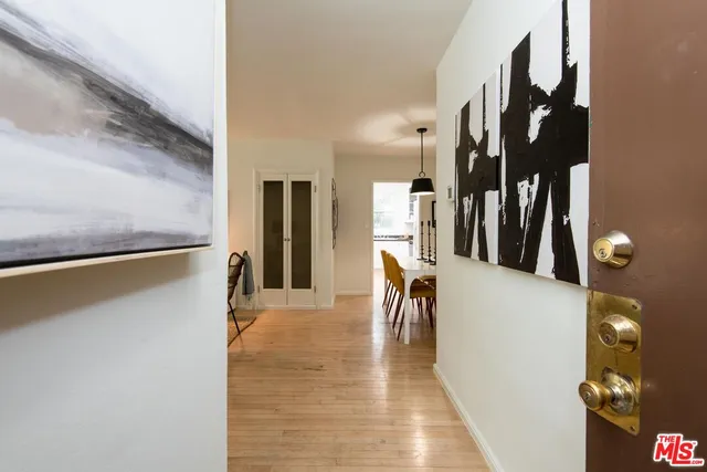 a view of a living room with furniture