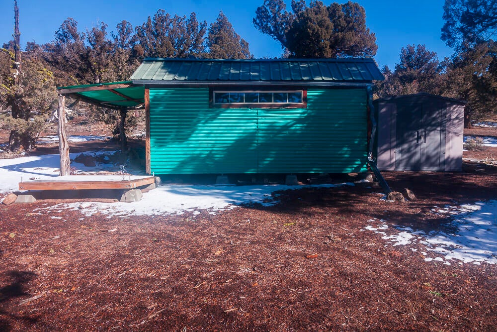 0 George Millican Road Bend, OR 97701 - Photo 30 of 34 Cabin & storage shed from the west.
