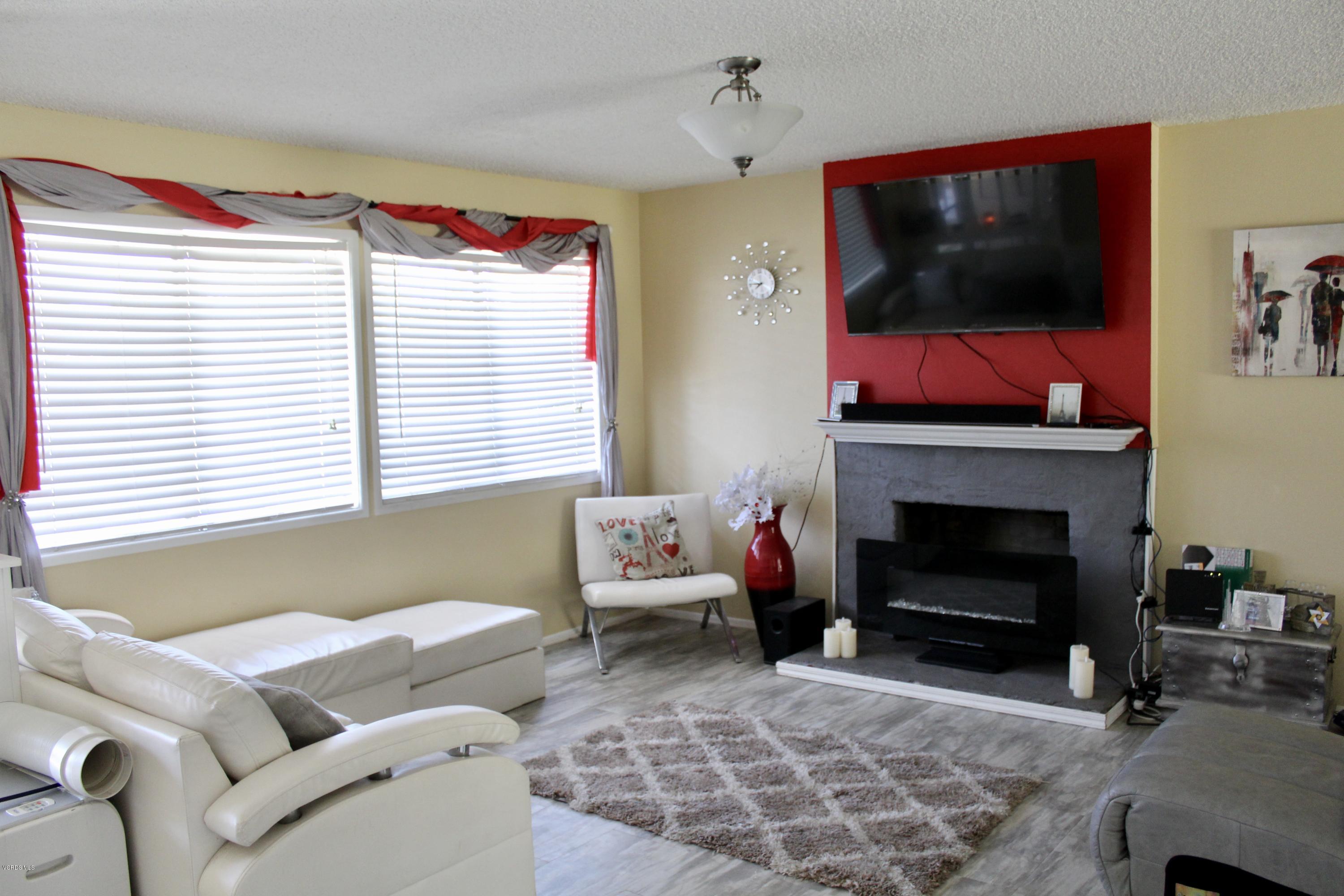 551 Keyser Rondo Camarillo, CA 93010 - Photo 2 of 7 Living room with Fireplace