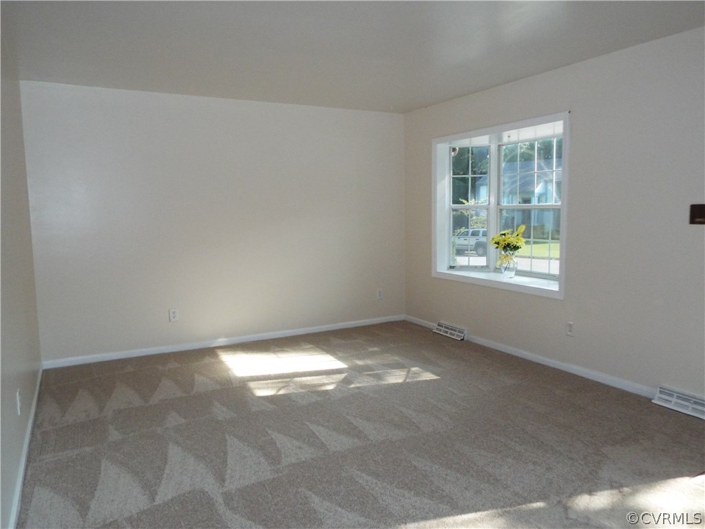 6009 Barrister Road Chesterfield, VA 23832 - Photo 3 of 8 a view of an empty room and window