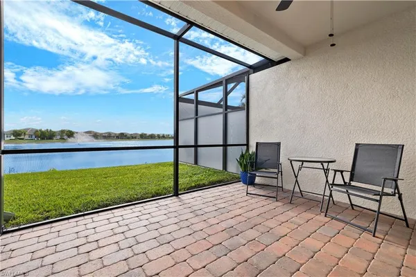 a view of a garden with an outdoor seating