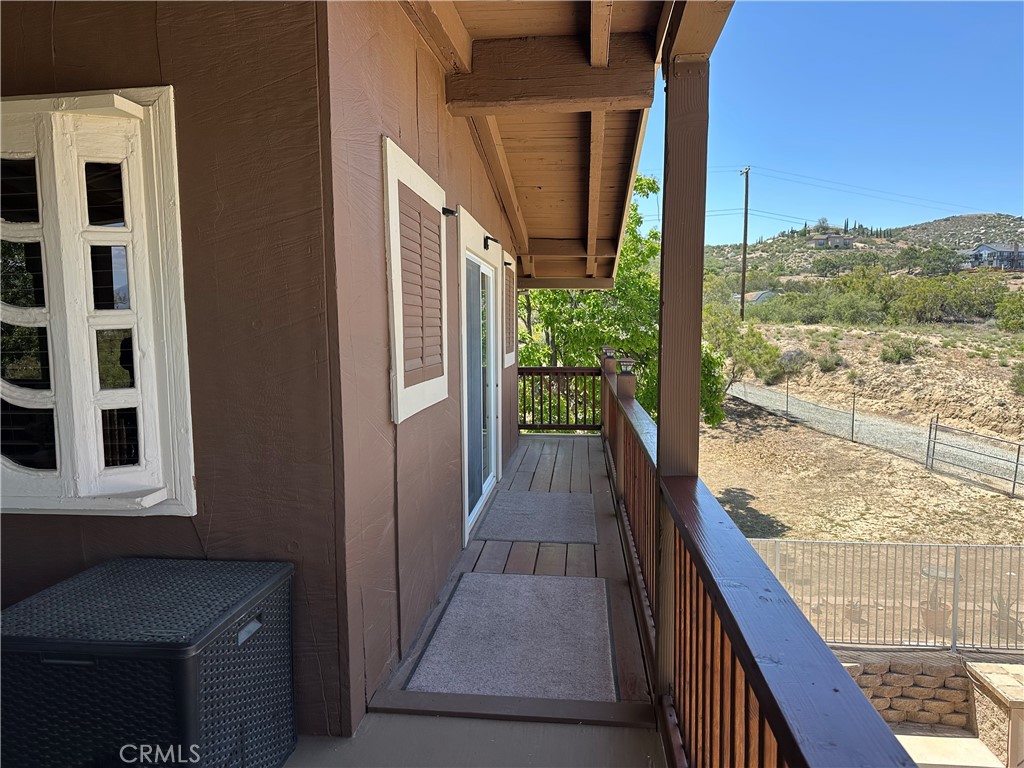 57260 Ramsey Road Anza, CA 92539 - Photo 11 of 46 a view of balcony with furniture