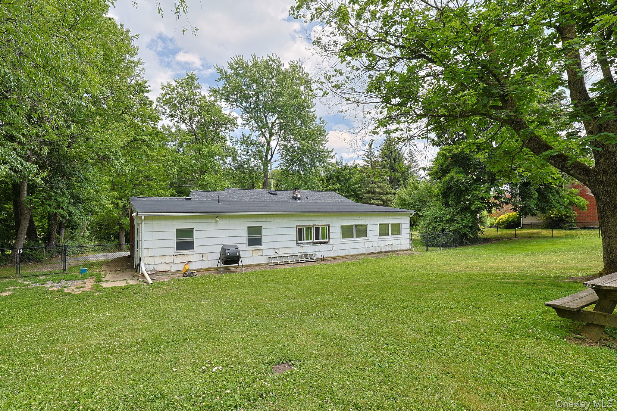 178 Mt Airy Road New Windsor, NY 12553 - Photo 30 of 31 a view of a house with a yard and sitting area
