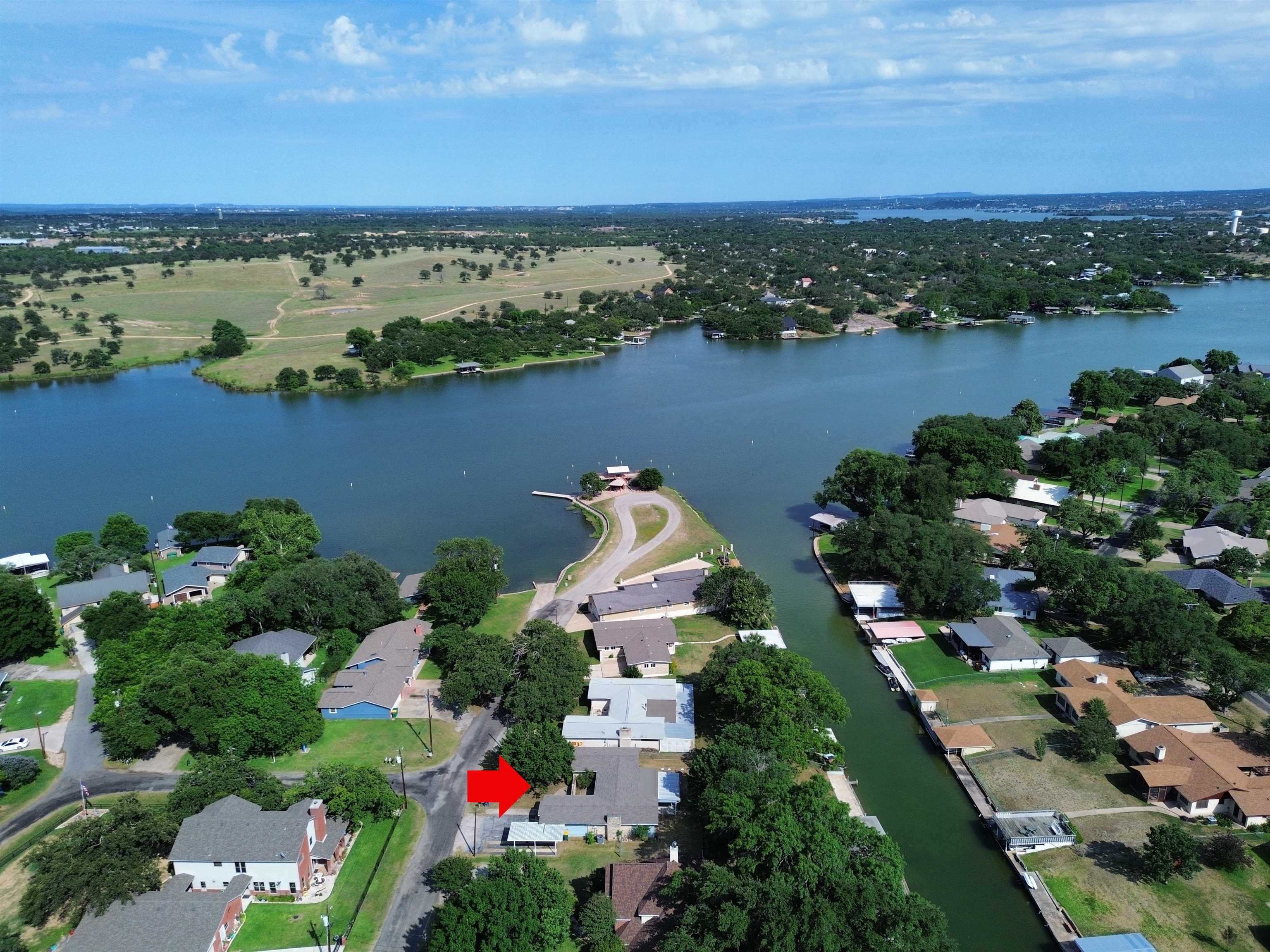 111 Dove Road Highland Haven, TX 78654 - Photo 1 of 19 an aerial view of multiple house