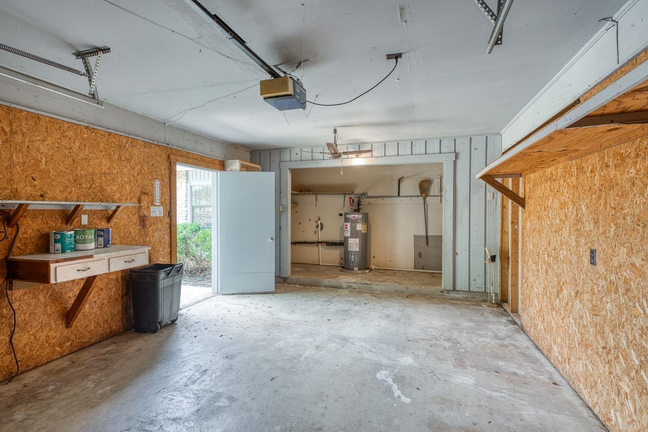 111 Dove Road Highland Haven, TX 78654 - Photo 17 of 19 a view of a big room with wooden floor and windows