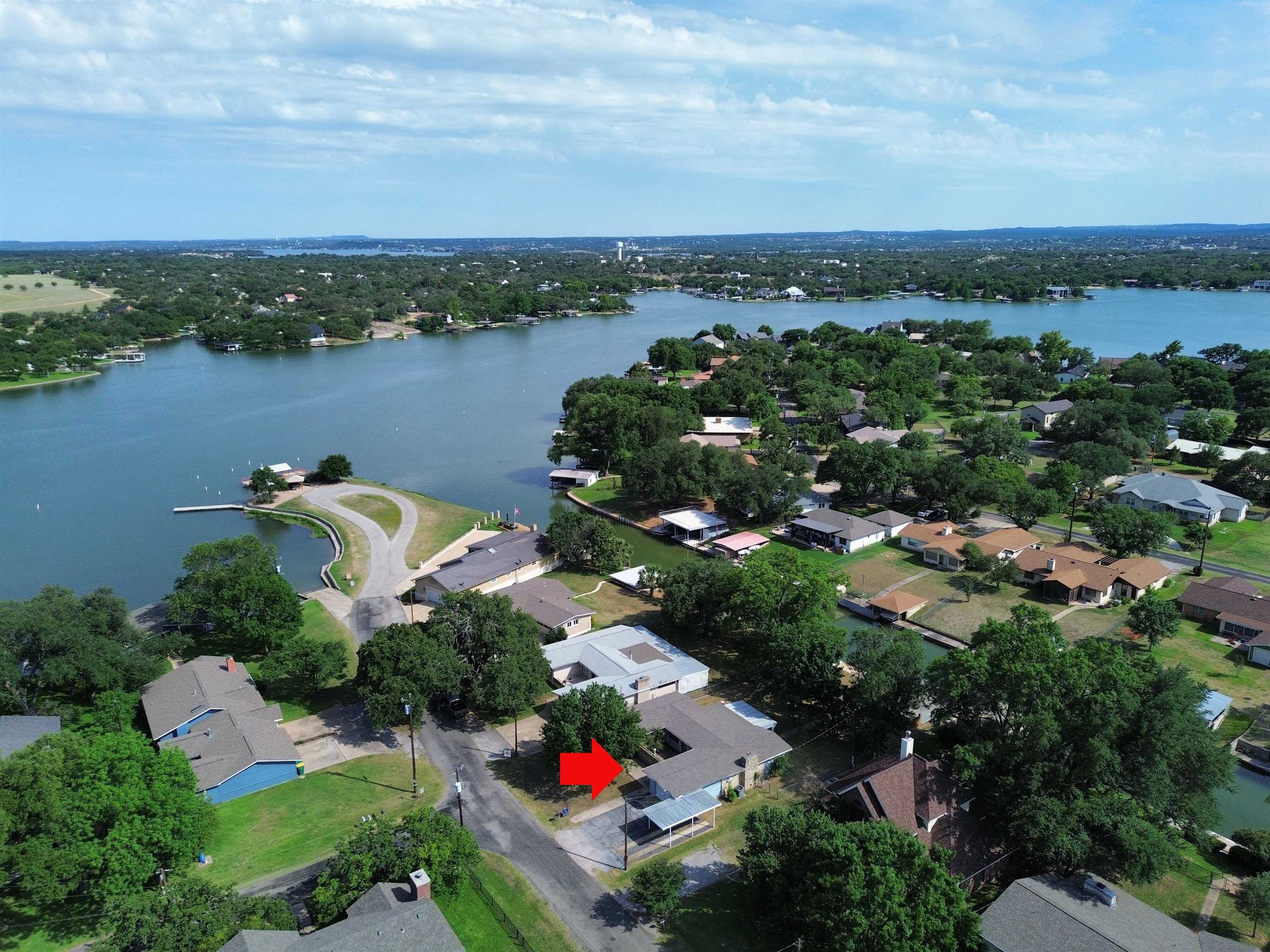 111 Dove Road Highland Haven, TX 78654 - Photo 18 of 19 an aerial view of a city and lake view
