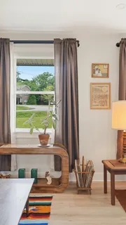 a room with furniture and a window