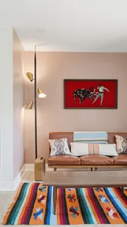 a bedroom with a bed and a book shelf