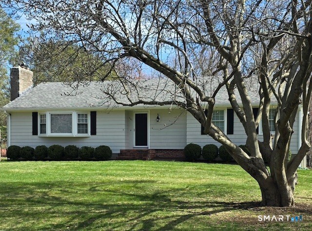 441 David Court Orange, CT 06477 - Photo 1 of 24 a house view with a garden space