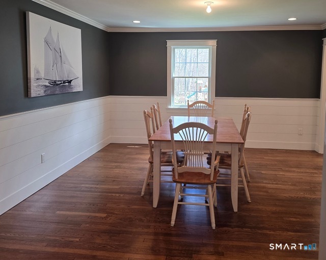 441 David Court Orange, CT 06477 - Photo 8 of 24 a view of a dining room with furniture and wooden floor