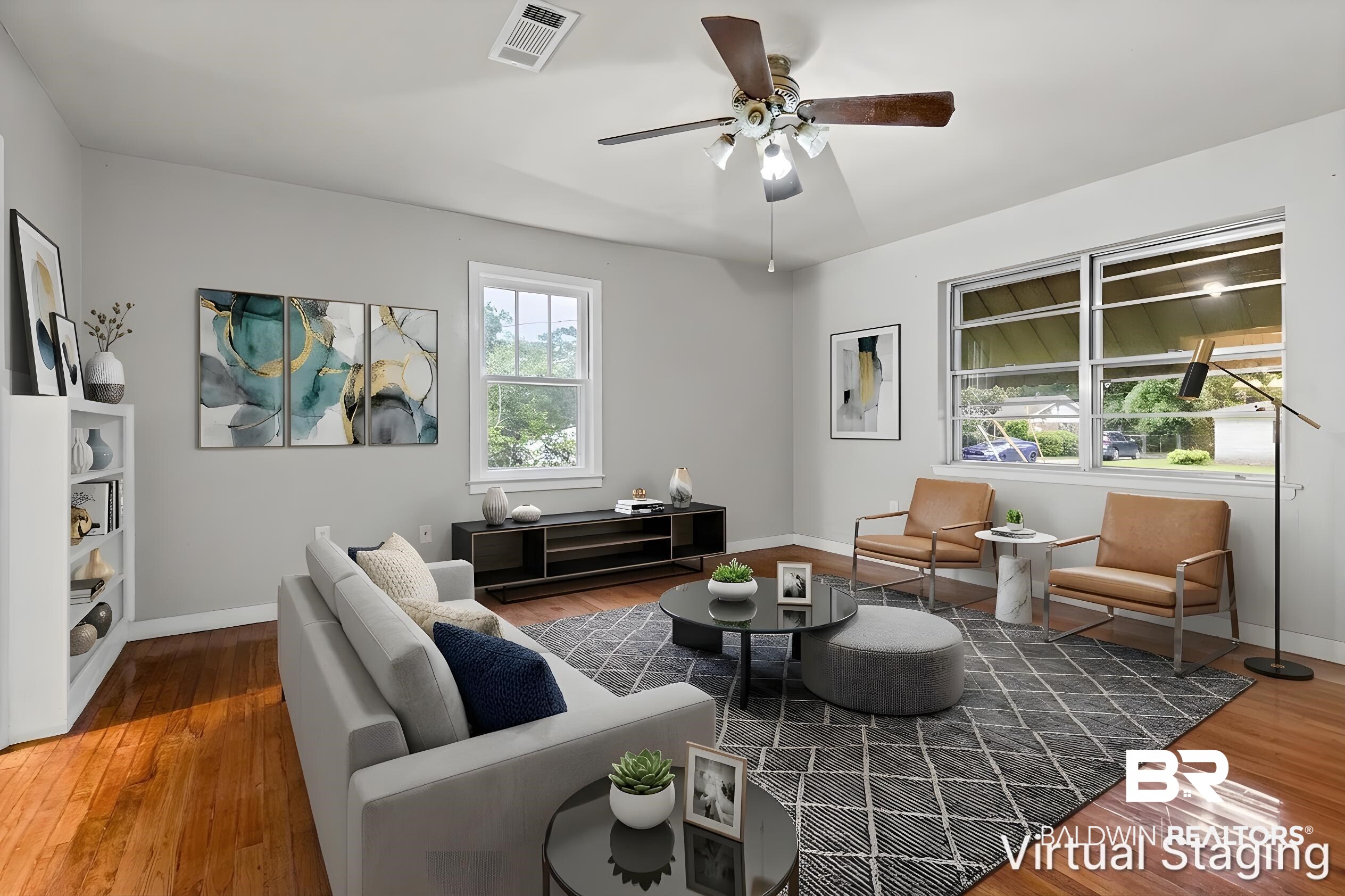 312 Sutherland Drive Mobile, AL 36611 - Photo 11 of 28 Virtually staged living room featuring rich wood-finish flooring and light gray wall paint