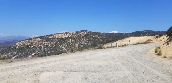 a view of mountain view with mountains in the background