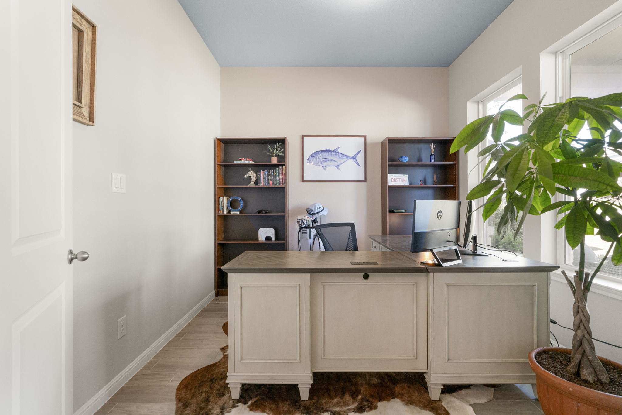 546 Hazy Hills Loop Dripping Springs, TX 78620 - Photo 24 of 40 The dedicated home office offers a quiet and productive workspace with abundant natural light.