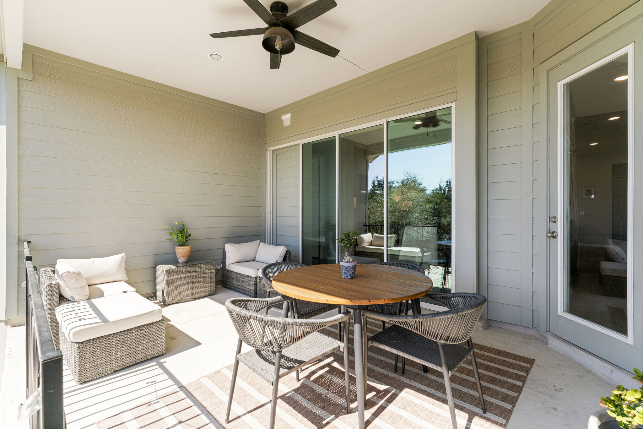 546 Hazy Hills Loop Dripping Springs, TX 78620 - Photo 33 of 40 The covered back patio extends the living space outdoors, creating the perfect place to relax or entertain.