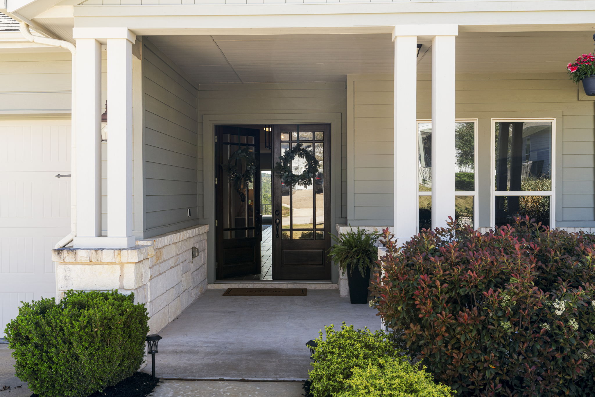 546 Hazy Hills Loop Dripping Springs, TX 78620 - Photo 36 of 40 The front porch creates a comfortable place to greet neighbors or enjoy quiet Hill Country evenings.