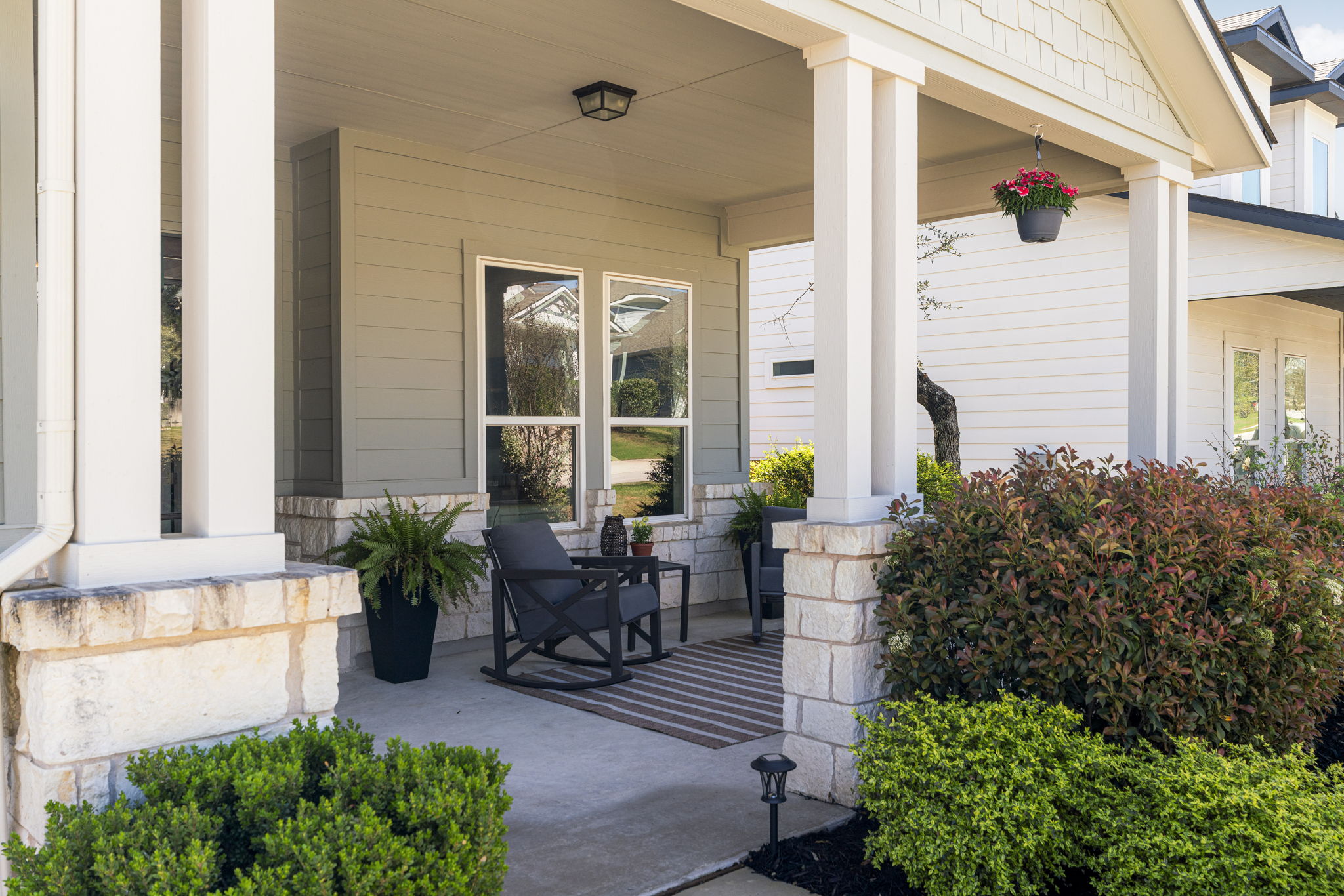 546 Hazy Hills Loop Dripping Springs, TX 78620 - Photo 37 of 40 A charming covered front porch creates a warm and inviting first impression as you arrive at the home.