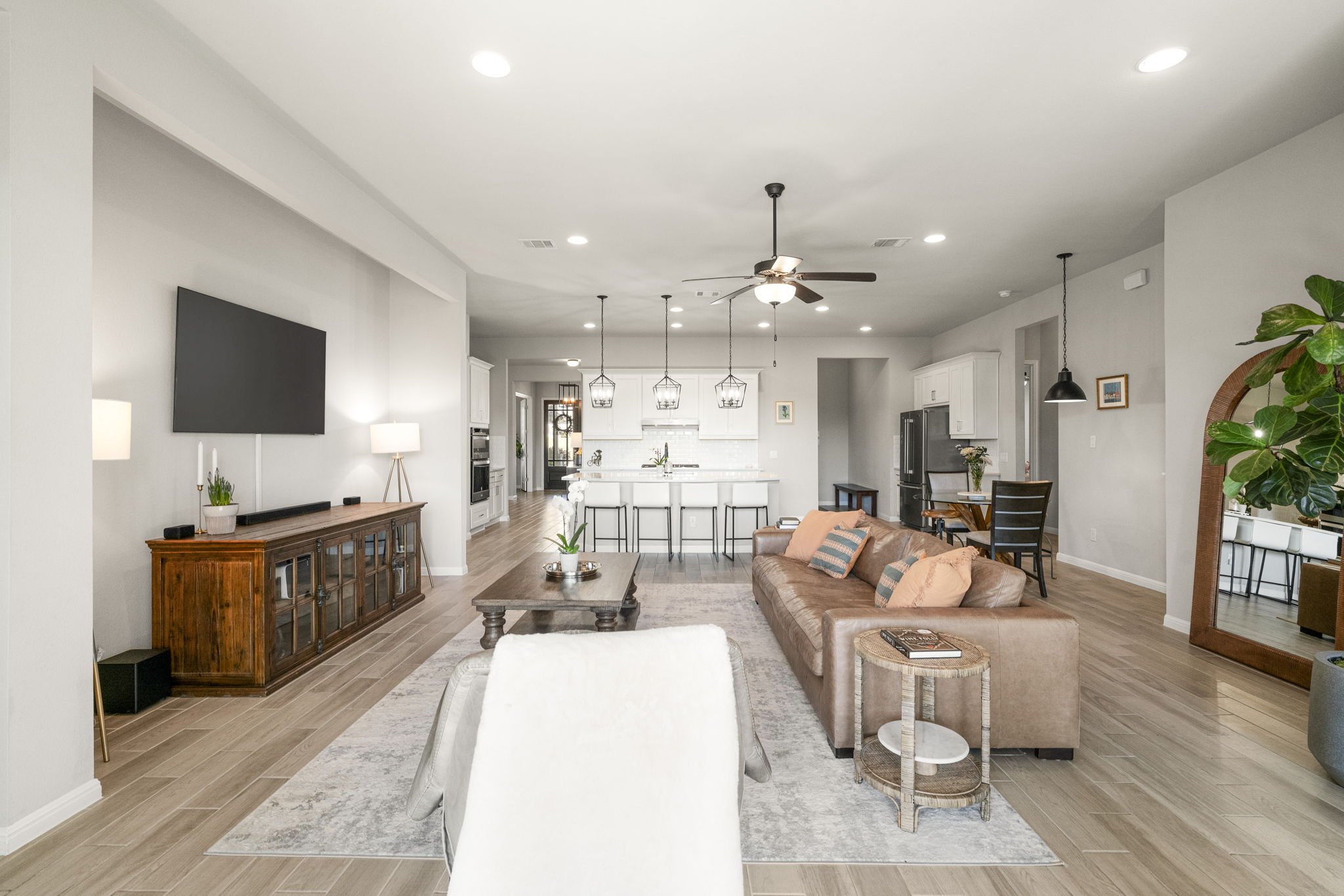 546 Hazy Hills Loop Dripping Springs, TX 78620 - Photo 9 of 40 The open living area is perfectly designed to bring people together, with expansive spaces throughout.