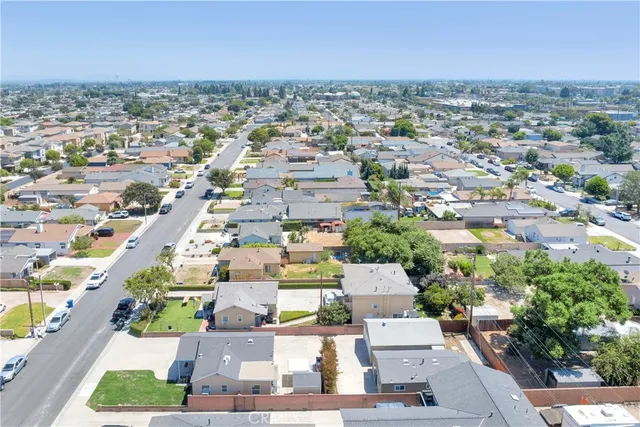 an aerial view of a city with lots of residential buildings