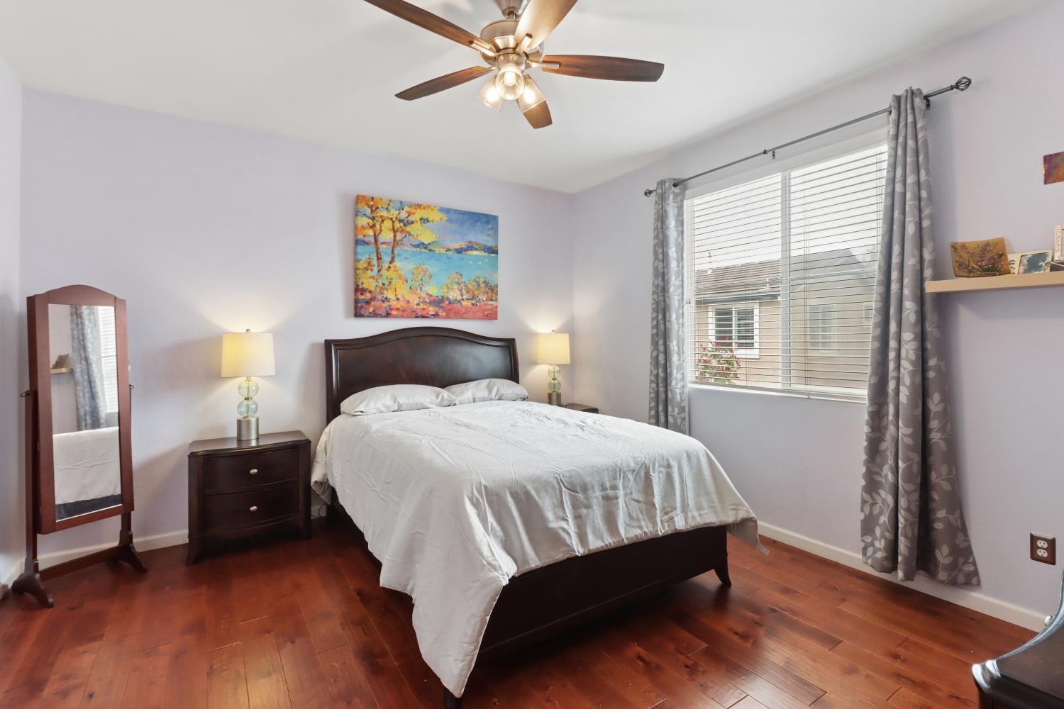 2012 Muscovy Road West Sacramento, CA 95691 - Photo 19 of 42 a bedroom with a bed and wooden floor