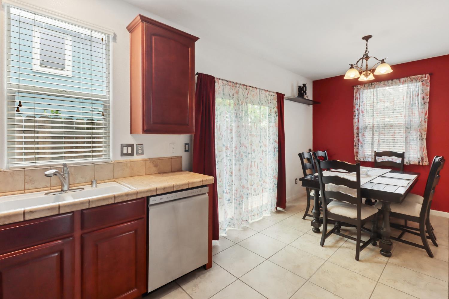 2012 Muscovy Road West Sacramento, CA 95691 - Photo 10 of 42 a view of a kitchen with a sink a table and chairs