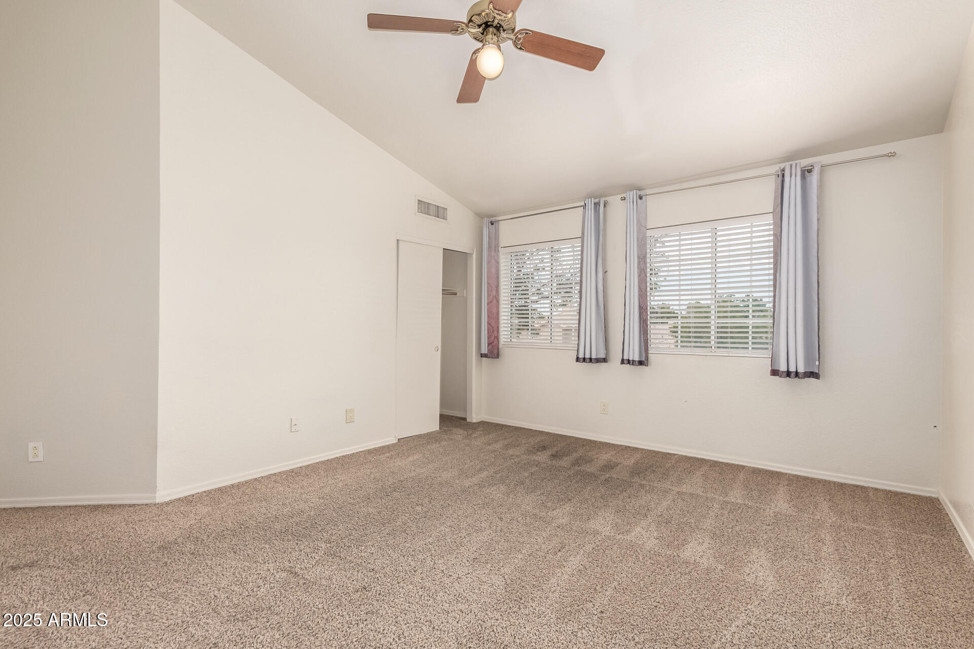 1691 East Gary Drive Chandler, AZ 85225 - Photo 15 of 45 an empty room with windows and fan