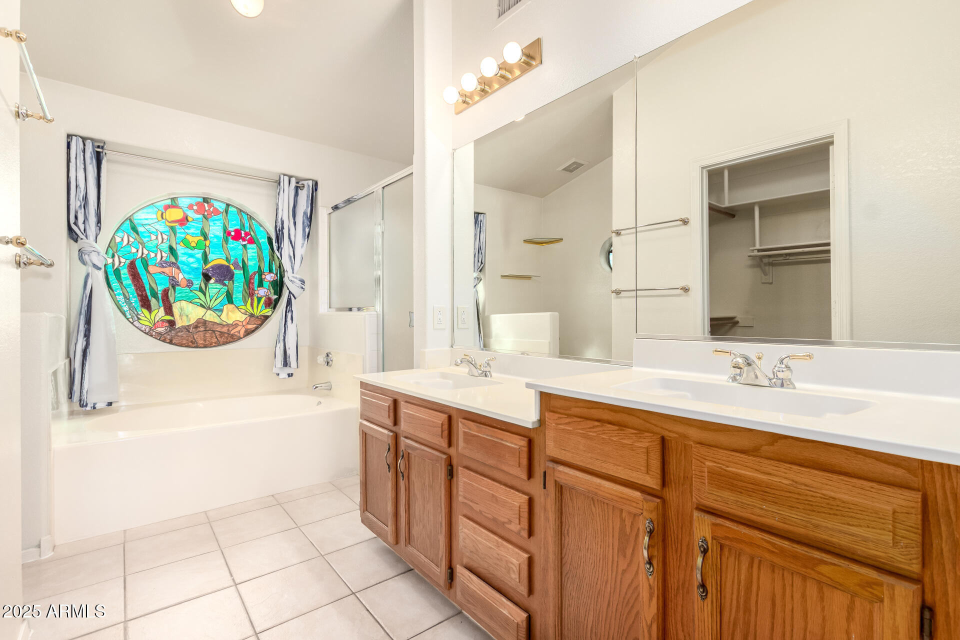 1691 East Gary Drive Chandler, AZ 85225 - Photo 18 of 45 a bathroom with a sink a vanity and a mirror