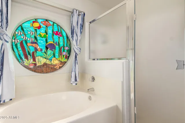 a bathroom with a bath tub