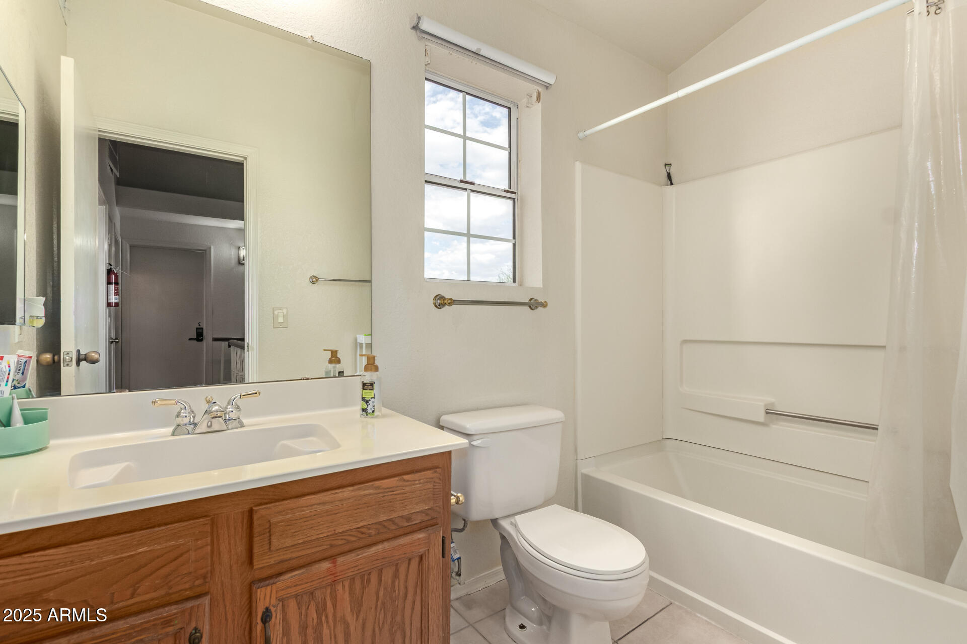 1691 East Gary Drive Chandler, AZ 85225 - Photo 23 of 45 a bathroom with a sink a toilet and shower