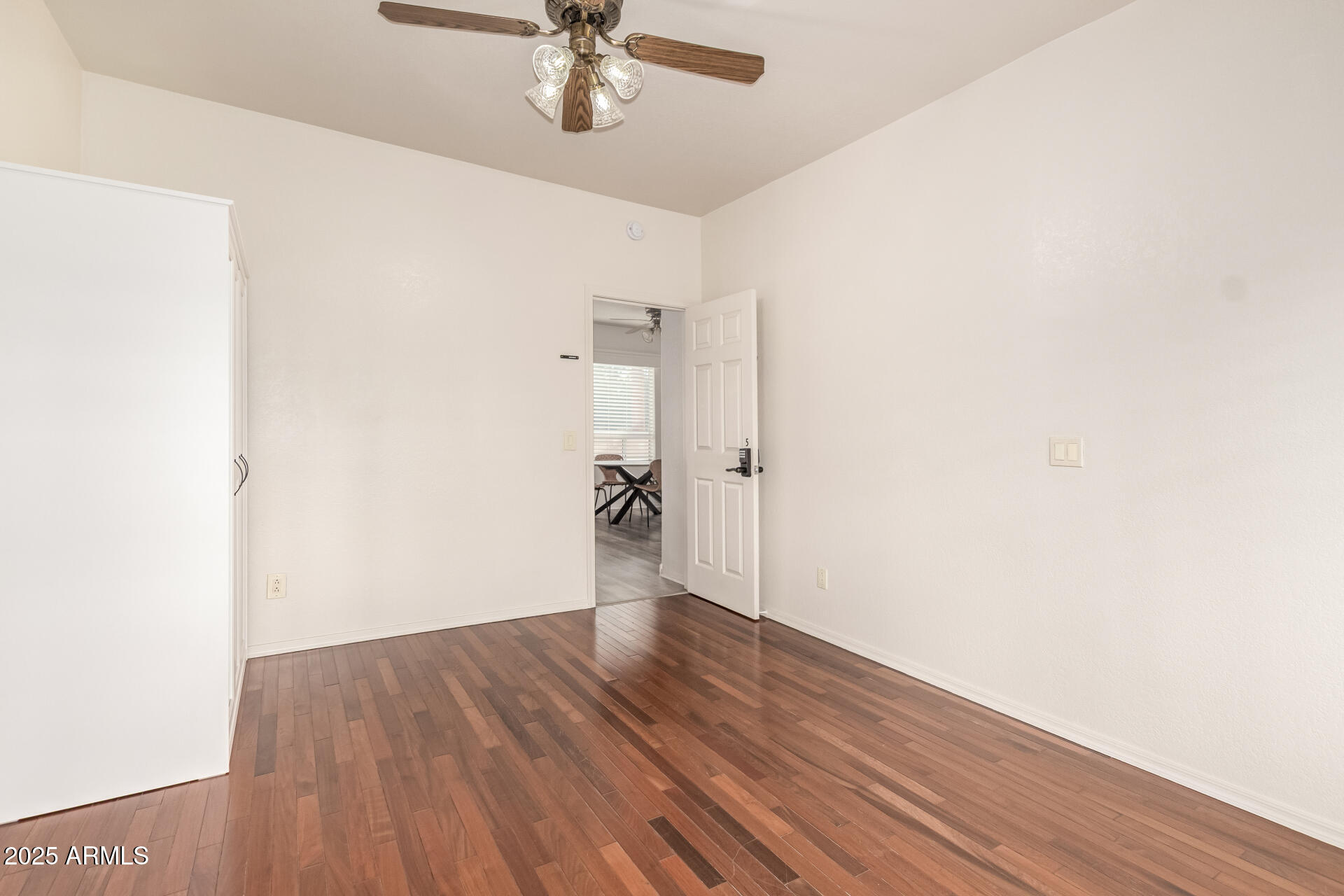 1691 East Gary Drive Chandler, AZ 85225 - Photo 37 of 45 a view of a room with wooden floor